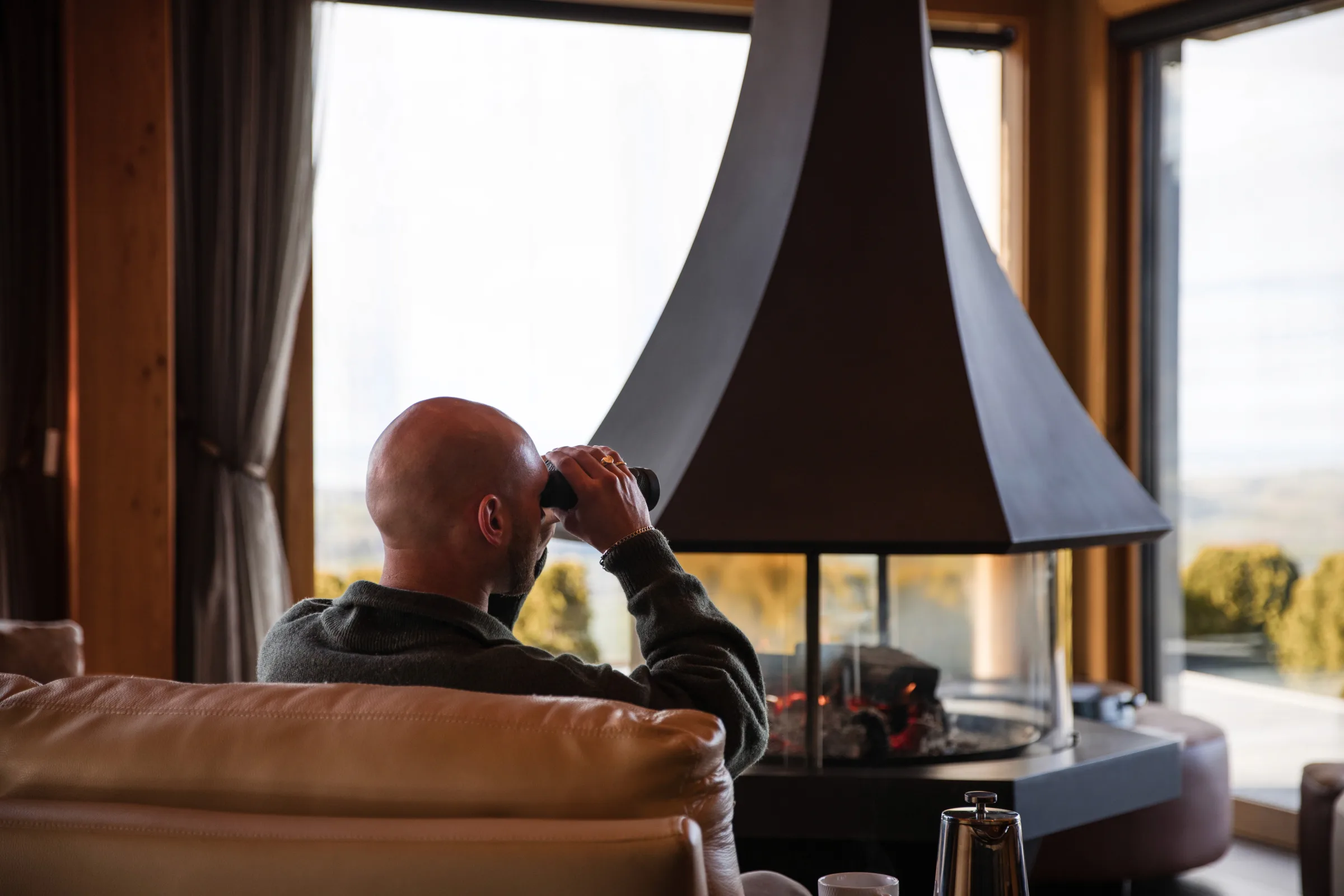 Guests enjoying the deck at Ata Rangi Lodge